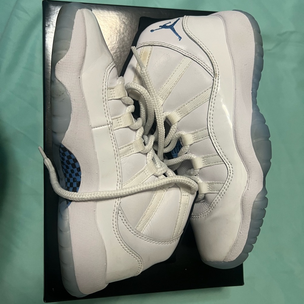 Jordan 11 Retro White and Blue Sneakers